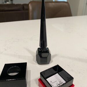 Christian Louboutin Nail Colour in Loubi Under Red